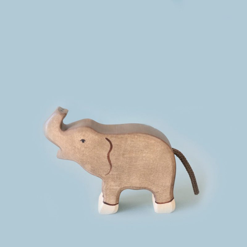 small elephant trunk raised